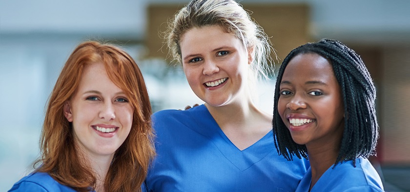 Three nurses smiling
