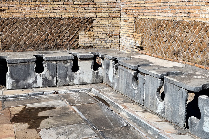 Image of old public stone toilets.