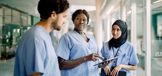 A group of nursing staff having a discussion.